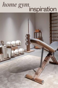 an image of a home gym in the middle of a room with white towels on the floor