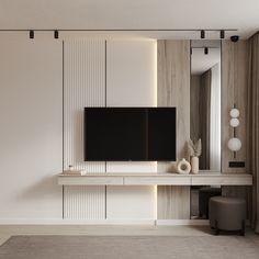 a flat screen tv sitting on top of a white shelf in a living room next to a mirror