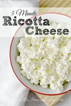 a bowl filled with ricotta cheese on top of a table