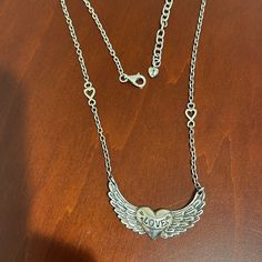 Sterling Silver Heart With Wings Necklace Marked Barse, Thai, And 925 Adjustable 17” To 19” Heart With Wings Measures 1 3/4” Across Wings Necklace, Heart With Wings, Wing Necklace, Sterling Silver Heart, Pricing Jewelry, Silver Heart, Womens Jewelry Necklace, Jewelry Necklaces, Necklaces