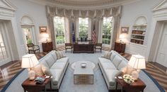 the oval room is decorated in white and gold