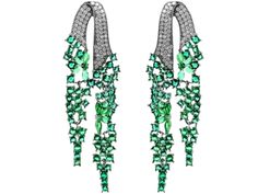 These stunning green earrings are elegant tassel earrings featuring a cascade of green gemstones, accented with zircon stones at the top.  They can be wearable everyday. The dimensions of the earrings are approximately 75 mm in length and 23 mm in width, making them a statement accessory suitable for special occasions. Their design combines a luxurious and high-fashion look, perfect for adding a touch of sophistication and glamour. These high-quality tassel earrings are ideal for: Formal Events: Luxury Green Dangle Chandelier Earrings, Luxury Green Chandelier Earrings, Luxury Green Dangle Earrings, Elegant Green Dangle Tassel Earrings, Green Chandelier Earrings For Evening With Pierced Ears, Green Dangle Crystal Earrings For Evening, Glamorous Green Dangle Chandelier Earrings, Glamorous Green Chandelier Earrings For Evening, High Fashion Looks