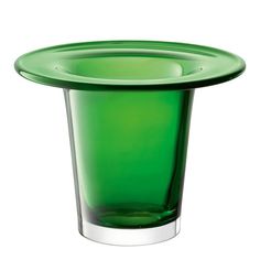 a green glass with a silver rim on it's side, sitting in front of a white background