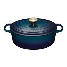 le creuset cast iron casserole in blue with brass knob and lid