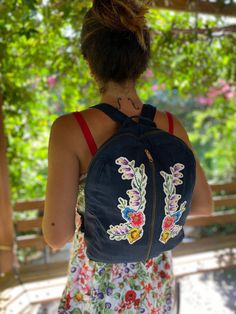 A lovely backpack for everyday use. Our collection includes a variety of designs to suit your style. Made out of denim. Not only eco-friendly but also fashionable, featuring trendy designs that will make you stand out. Approximate dimensions of the backpack: Width: 32 cm Height: 38 cm Handle: 75 cm This is 100% handmade that has variations of colours, texture. Small imperfections/differences in shape, size and colour can happen and are part of the charm of a handmade product. Please do not hesitate to contact me with your questions. Flowers, Cross Stitch, Denim Backpack, Large soft denim Backpack bag, Casual Backpack, Daily Backpack, Travel Backpack, School Backpack, Laptop Bag, Notebook Bag Casual Summer Backpack For Daily Use, Casual Softback Backpack For Spring, Spring Backpack With Zipper Closure For Daily Use, Casual Embroidered Travel Bag, Blue Backpack For Everyday Use In Spring, Blue Backpack For Daily Use In Spring, Spring Embroidered Backpack, Trendy Embroidered Backpack For Travel, Summer Travel Backpack In Cotton