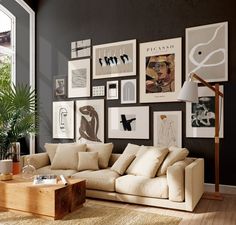 a living room filled with lots of pictures on the wall above a beige sectional couch