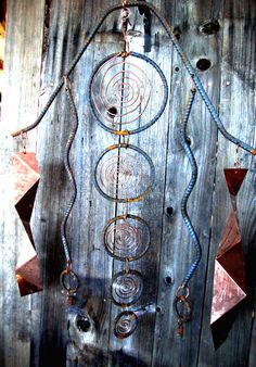 a wooden door with metal decorations on it