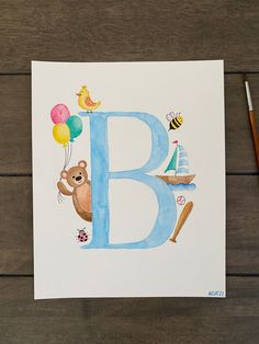 the letter b is painted with watercolors on paper