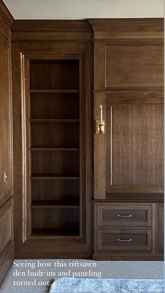 an empty bookcase in the corner of a room with built - in shelving