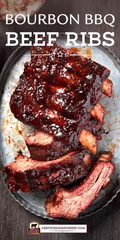 bourbon bbq beef ribs on a plate with barbecue sauce in the background and text overlay that reads bourbon bbq beef ribs