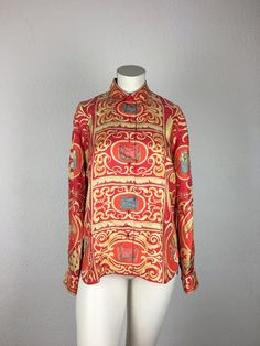 An extraordinary & rare find! Original vintage blouse from HERMES - PARIS red gold/yellow patterned Size - dimensions approximately L/Large: Shoulder width: 40 cm / 15.6 inch Chest circumference: 100 cm / 39.4 inch Waist circumference: 99 cm / 39.0 inch Length: 66 cm / 26.0 inches outstanding condition! buttoned at the front hidden button on the collar Material: 100% silk Sizes according to https://www.sizechart.com/clothing/women/european/index.html Measured at the widest part of the chest (arm Luxury Silk Printed Blouse, Luxury Printed Silk Tops, Designer Formal Printed Tops, Designer Printed Tops For Formal Occasions, Luxury Printed Tops For Formal Occasions, Gold Luxury Blouse For Formal Occasions, Designer Long Sleeve Yellow Tops, Designer Long Sleeve Red Top, Luxury Multicolor Silk Tops