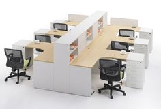 an office cubicle with desks and chairs