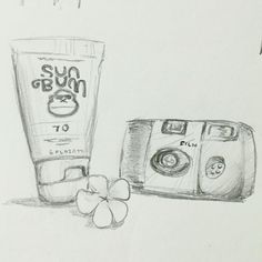 a pencil drawing of a camera and sunburn sunscreenr next to each other