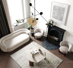 a living room filled with furniture and a fire place in the middle of the room