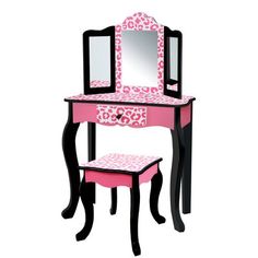 Give your little one a place to get ready while adding elegant decor with the Fantasy Fields Gisele Leopard Print Vanity Set with Tri-Fold Mirror and Chair. This colorful vanity set features a pink and black design decorated with leopard print for a fun and functional addition to your child's bedroom or play area. This kid's vanity set features a three-mirror setup and an included stool to make getting ready easy and fun. The included built-in drawer provides plenty of space for makeup, brushes, Colorful Vanity, Black Makeup Vanity, Kids Vanity Set, Fantasy Fields, Hot Pink Leopard Print, Hot Pink Leopard, Mirror Stool, Trifold Mirror, Vanity Table Set