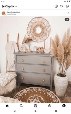 a bedroom with a dresser, mirror and rugs on the floor in front of it