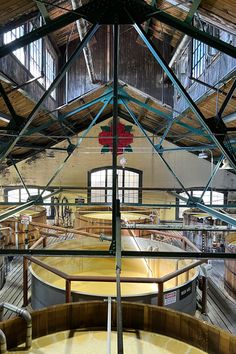 A view of the bourbon-making process at the Four Roses Distillery under the architectural trusses. Bourbon Distillery, Interior Design Styles Guide, Industrial Style Interior Design, Four Roses Bourbon, Learn Interior Design, Kentucky Bourbon Trail, Interior Design Student, Interior Design Images, Bar Interior Design