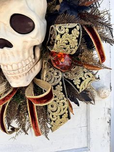 a wreath with a fake skull on it