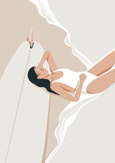 a woman laying on top of a surfboard