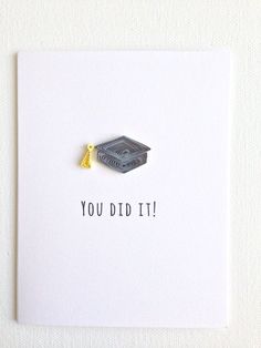 a card with a graduation cap and tassel on it that says, you did it