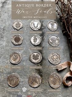 antique border wax seals are displayed on a stone surface