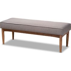 a wooden bench with a gray cushion on top of it's backrests