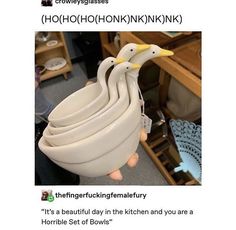 a person holding a bunch of white bowls in their hands with the caption'it's beautiful day the kitchen and you are a horrible set of bowls