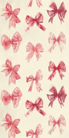 a bunch of bows that are on top of a white paper sheet with watercolor paint