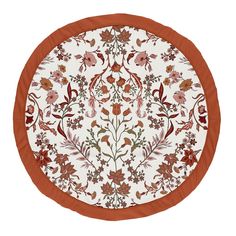 an orange and white plate with flowers on it