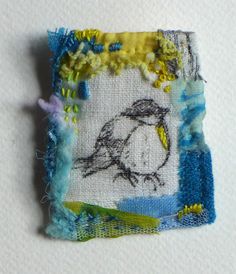 a piece of fabric with a bird drawn on it