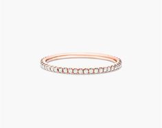 14K Rose Gold Single Row Ever After Diamond Ring. Delicately crafted in 14K rose gold, this single row diamond band is chic and timeless. Wear this simply beautiful band on its own or stack with other rings for a fashion forward look. Classic Stackable Rose Gold Diamond Ring, Fine Jewelry Stackable Rose Gold Rings, Rose Gold Diamond Band In Fine Jewelry Style, Everyday Rose Gold Diamond Ring With Single Cut Diamonds, Rose Gold Diamond Stackable Rings, Round Band, Rose Gold Diamond Stackable Rings With Round Band, Rose Gold Diamond Stackable Rings, Classic Rose Gold Stackable Rings With Brilliant Cut, Rose Gold Stackable Rings With Prong Setting