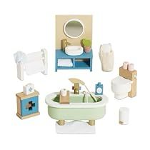 a toy bathroom with sink, toilet and other items