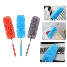 three different types of cleaning brushes on top of a laptop