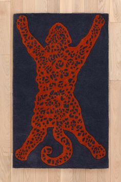 a rug with an image of a person in leopard print on the front and back