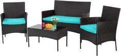 three pieces of outdoor furniture with blue cushions