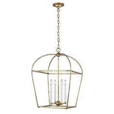 an antique brass cage chandelier with three candles hanging from the front and side