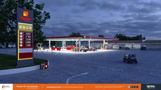 an image of a gas station at night