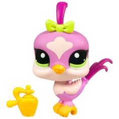 a littlest pet shop figurine with a pink bird