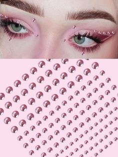 a woman's eyes with pink glitters on them