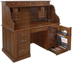 a wooden desk with drawers and a book shelf in the bottom drawer that is open