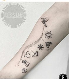 a woman's arm with tattoos on it and the words, dots and lines