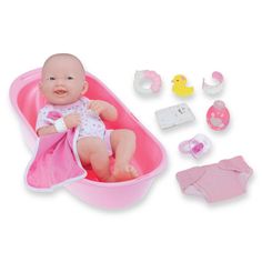 a baby doll sitting in a bathtub with accessories