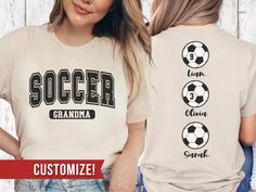 two women wearing matching shirts with soccer designs