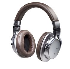 the sony headphones are on display in front of a white background and one is brown