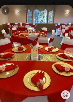 red and white tables with gold place settings