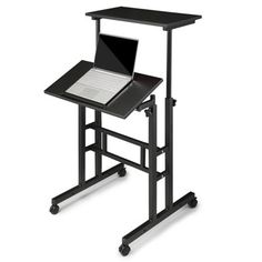 a black computer desk with a laptop on it