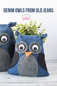 two owls made out of old jeans sitting next to each other with the words denim owls from old jeans