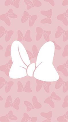 a pink background with white bows on it