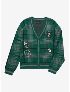 a green cardigan sweater with patches on it