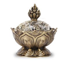 a golden bowl with ornate designs on it